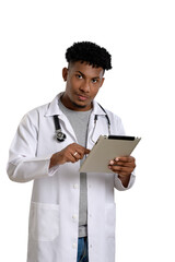 A confident doctor, in a white coat, using a digital tablet.