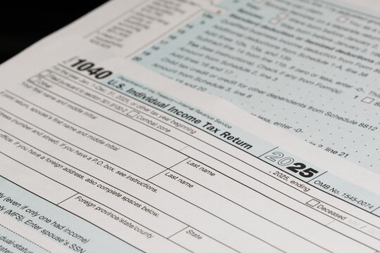 A low-angle close up of IRS form 20251040 with focus on filing year