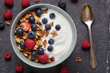 Delicious breakfast bowl with yogurt granola and fresh berries