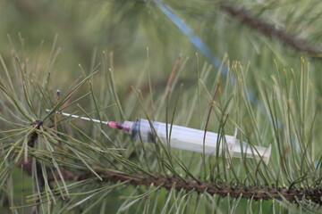 Used, lost syringe. Drug addiction dirty object