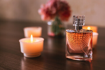 Women's pink perfume and flowers