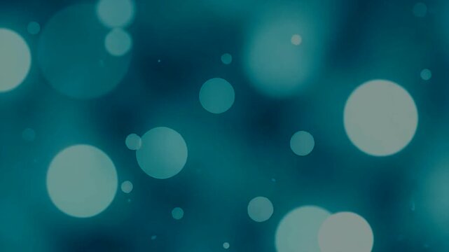 Soft blue bokeh background with light orbs shining