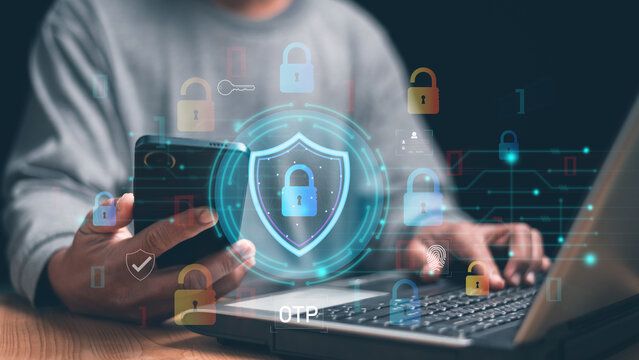 Cybersecurity and digital privacy. Person use smartphone and laptop with virtual shield, padlock icons. OTP authentication, data protection, secure login, network security and online identity safety. - Powered by Adobe