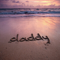 Daddy Written in Wet Beach Sand with Clean Lowercase Letters, Calm Ocean Waves and Pastel Sunset Reflections &ndash; perfect for father&rsquo;s day promotions