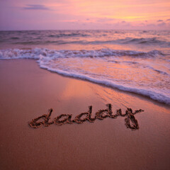 Daddy Handwritten in Smooth Wet Sand with Gentle Ocean Foam Lines and Peach Lavender Sunset Reflections, Clean Minimal Scene &ndash; great for family keepsakes