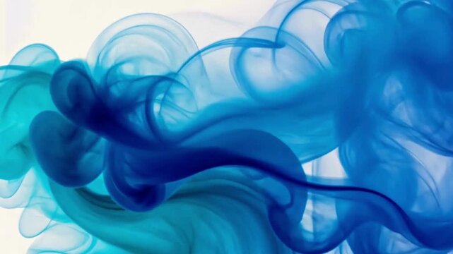 Blue Ink Swirling in Water Creating Abstract Organic Shapes with Fluid Motion