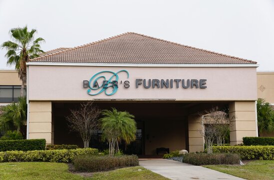 Sarasota, Florida, U.S.A - Jan 4, 2026 - The exterior view of a Baer&rsquo;s Furniture store featuring Mediterranean-style architecture and manicured landscaping