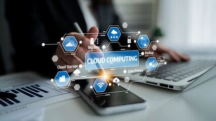 A modern workspace featuring cloud computing graphics that illustrate data storage, privacy, and backup solutions, highlighting technology role in business efficiency. Tessel