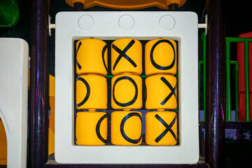 Tic-tac-toe game activity panel installed in the children playground (XO Game) 