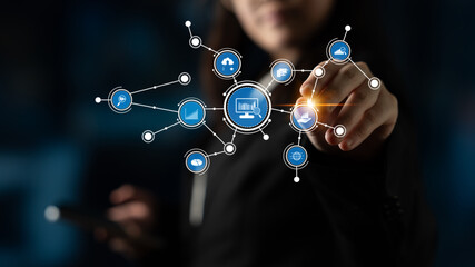 A businessman is interacting with a digital network interface by touching icons, symbolizing technology, communication, and innovative data visualization for modern business solutions. Tessel