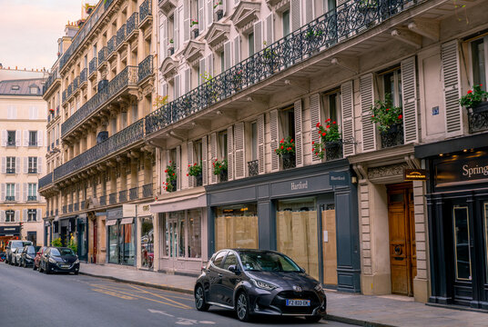 Paris, France 08 04 2023: Summer sunset on Rue des Saints-Peres street in Paris, France. Its name comes from the alteration of "Saint-Pierre", the name of an old chapel of the former hospital of