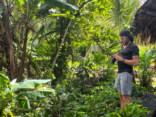 young photographer in a garden