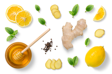 Clean flat lay of fresh ginger root, lemon slices, honey bowl with dipper and mint leaves isolated on white background. High-quality PNG for food packaging, wellness branding, label design.