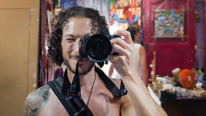 young man with camera