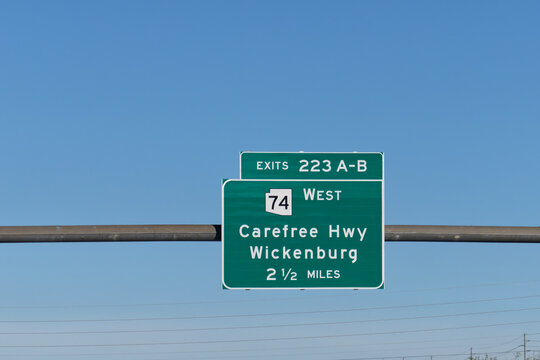 exit 223 A-B sign on I-17 for AZ-74 West to Carefree Highway and Wickenburg, Arizona