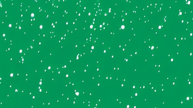 Animated particles floating on a green screen background in 4K resolution at 24 frames per second