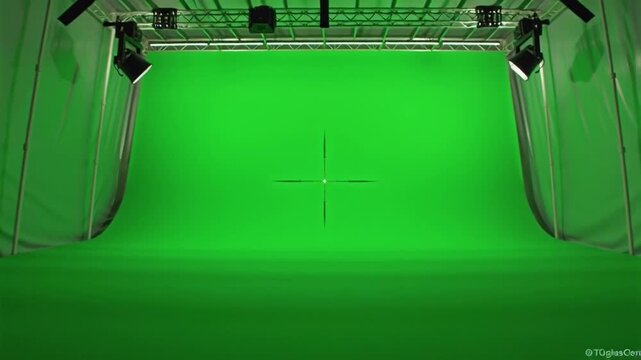 A large green screen studio with infrared motion capture technology is set up for filming a 4K resolution video at 24 frames per second.
