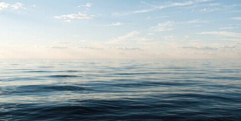 Obraz premium Calm Ocean Waves Under a Clear Sky at Sunset