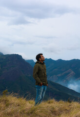 Fototapeta premium hiker on top of a mountain