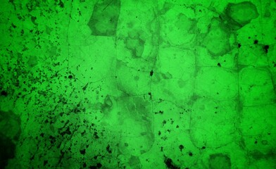 Vivid, textured green surface with pronounced cracks creates a bold abstract backdrop. Ideal for nature-inspired, eco-friendly, or modern design projects needing a striking green texture.
