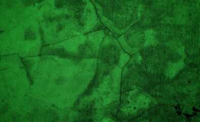 Vivid, textured green surface with pronounced cracks creates a bold abstract backdrop. Ideal for nature-inspired, eco-friendly, or modern design projects needing a striking green texture.
