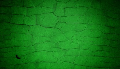 Vivid, textured green surface with pronounced cracks creates a bold abstract backdrop. Ideal for nature-inspired, eco-friendly, or modern design projects needing a striking green texture.