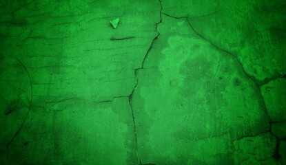 Vivid, textured green surface with pronounced cracks creates a bold abstract backdrop. Ideal for nature-inspired, eco-friendly, or modern design projects needing a striking green texture.