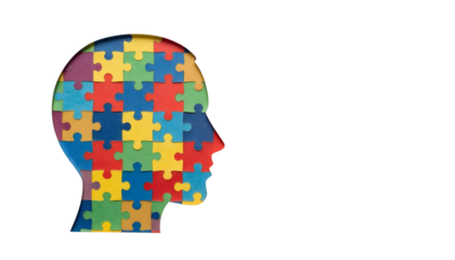 A head composed of colorful puzzle pieces, symbolizing neurodiversity for National Autism Awareness Month