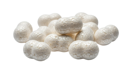 A collection of oddly shaped white candies.  These treats are arranged in a random pile, making for a unique visual experience. transparent background