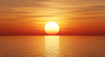 Sunset over calm ocean waters with vibrant orange hues and serene atmosphere at dusk.