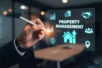 Businessman hand using digital interface for property management with real estate icons and graph