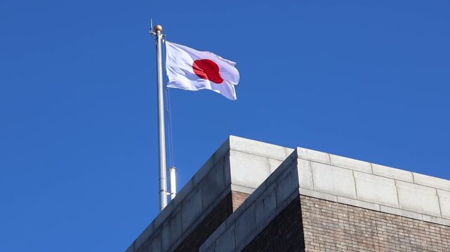 Japan flag with blue sky. Japanese flag