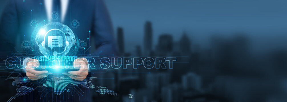 Customer support technology, Businessman using customer support technology with tablet on global network, assistance and troubleshooting, Global customer and technical support, and digital assistance. - Powered by Adobe