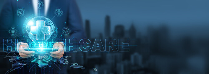 Healthcare technology, Businessman utilizing healthcare technology with tablet on global network, innovation and accessibility, Global healthcare solutions and improved patient outcomes, revolution.