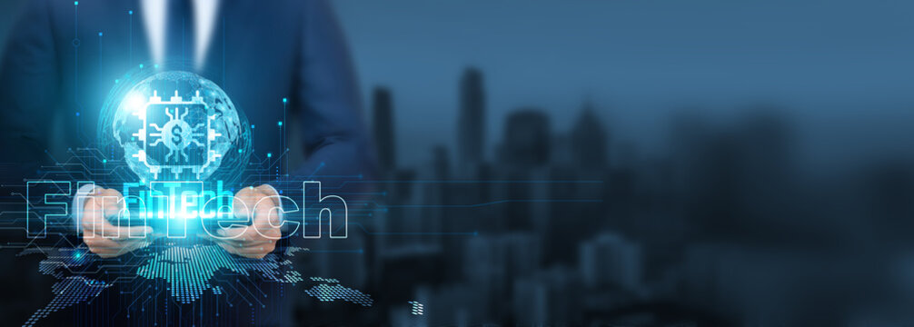 Fintech technology, Businessman using of fintech technology with tablet on global network, financial and transactions, Global banking and investment strategies, and digital transactions. - Powered by Adobe