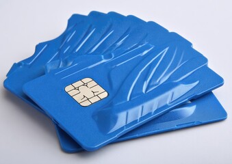 Stack of blank blue smart cards with microchips.