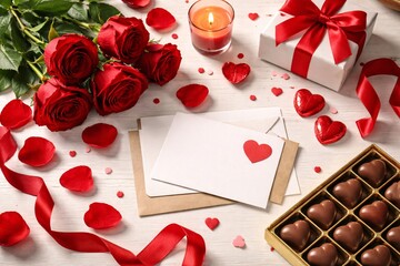 Valentine&rsquo;s Day flat lay with red roses, chocolates and gift box