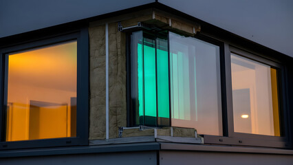 Detail view of passive house construction, showcasing energy-efficient windows and modern building materials, a testament to sustainable architecture.