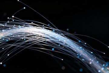Fiber optic light strands on black background