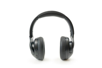 Black over ear wireless headphones isolated on a white background. Modern headphone design with padded ear cups and adjustable headband, suitable for audio and technology related concepts.