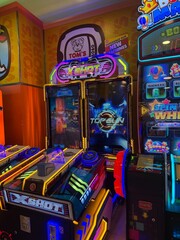 a row of arcade game machines