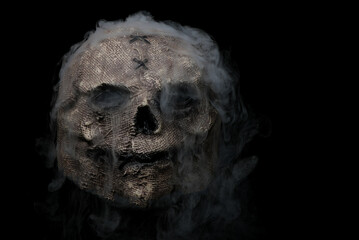 Halloween Creepy mask hand made with silicon by photographer with swirling smoke and mist