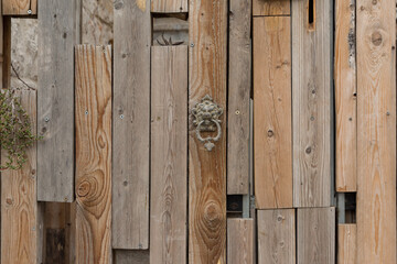 Background with the texture of wooden slats exposed to climatic conditions