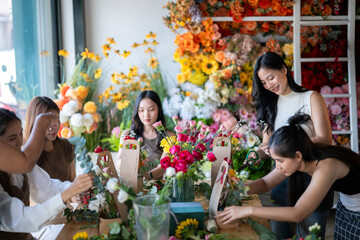 Women learning flower arranging hobby creative workshop