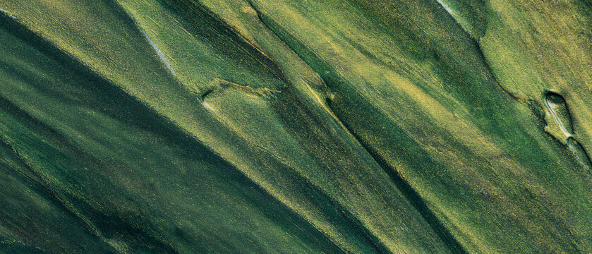Green Gold Glitter Oil Paint Background with Diagonal Brush Strokes and Metallic Texture