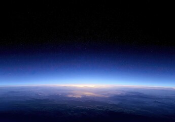Fototapeta premium Expansive view of Earth's luminous horizon from space, with stars dotting the dark cosmos