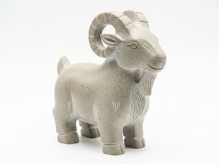Stone ram figurine on white background