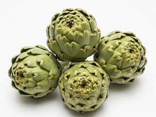 Fototapeta premium Fresh artichokes on white background