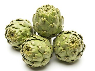 Fototapeta premium Fresh artichokes on white background
