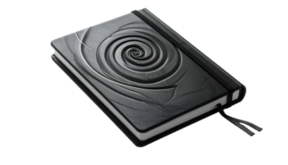 Angled shot of a closed notebook with a spiral design embossed on the cover, black